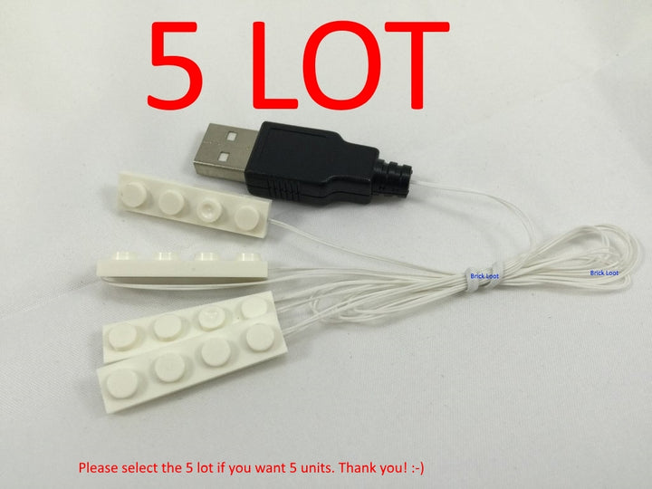 Brick Loot 4 white plates 1x4 white down lights LED Kit installed (powered through USB) - sold separately or as a 5-lot, if you would like to purchase 5 units at a time.