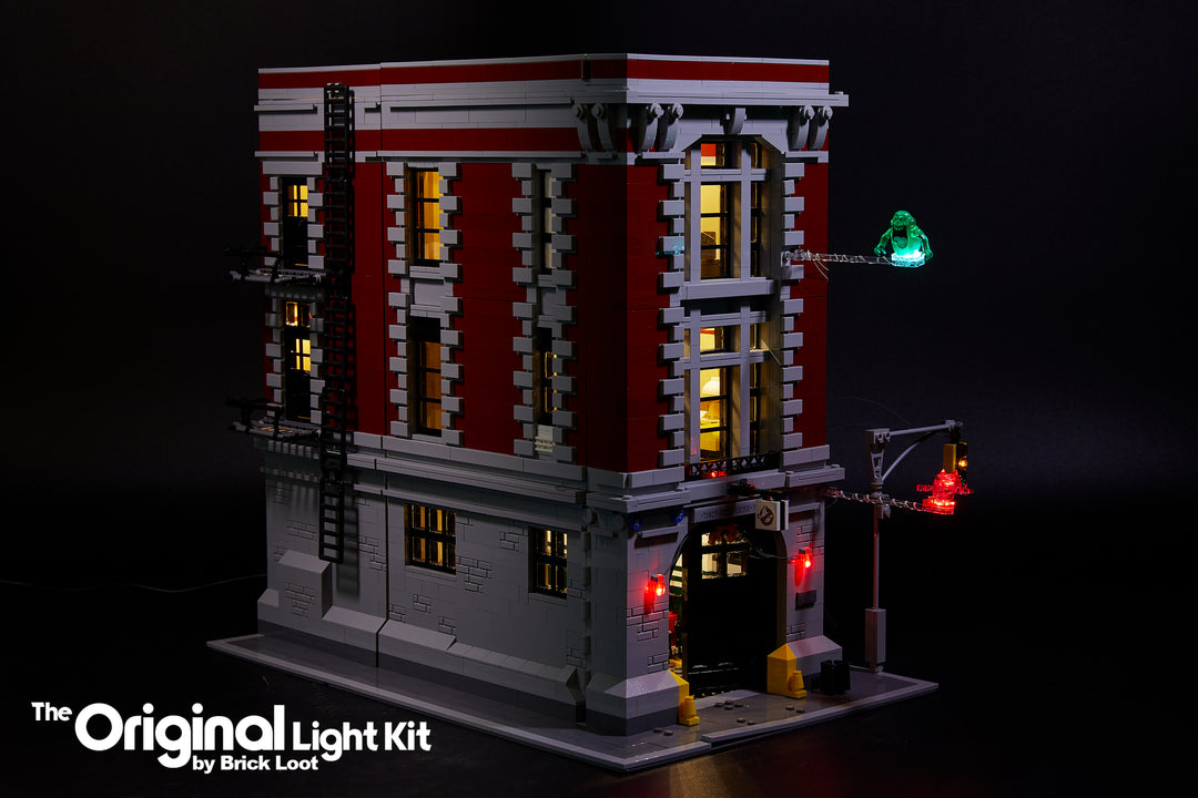 Exterior of the LEGO Ghostbusters Firehouse Headquarters set 75827, illuminated with the Brick Loot LED Light Kit.