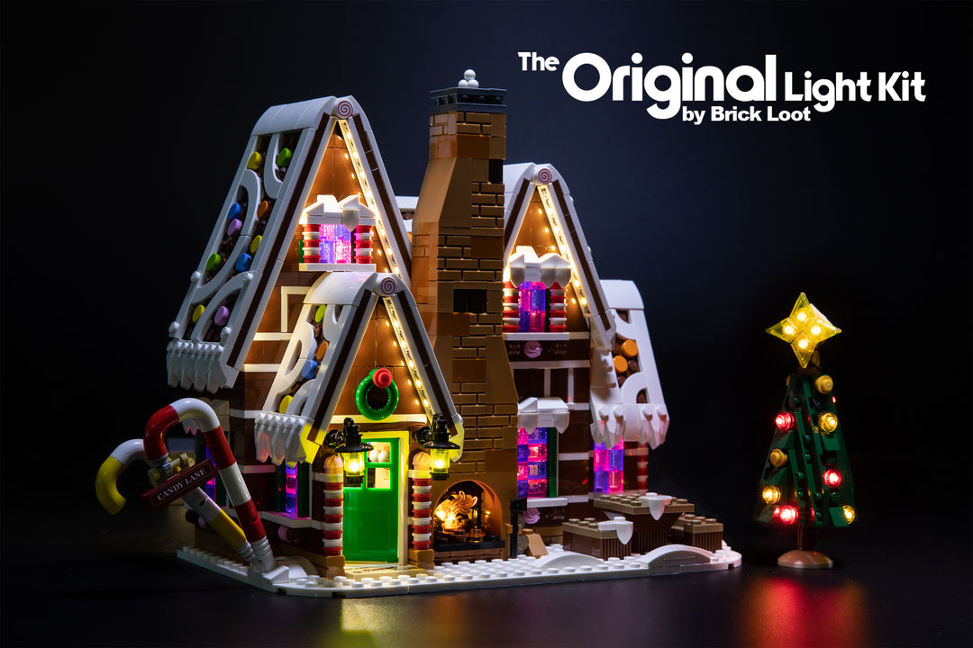 Exterior of the LEGO Gingerbread House set 10267, beautifully illuminated with the Brick Loot LED Light kit! The light kit includes lights for the Christmas tree and fireplace!