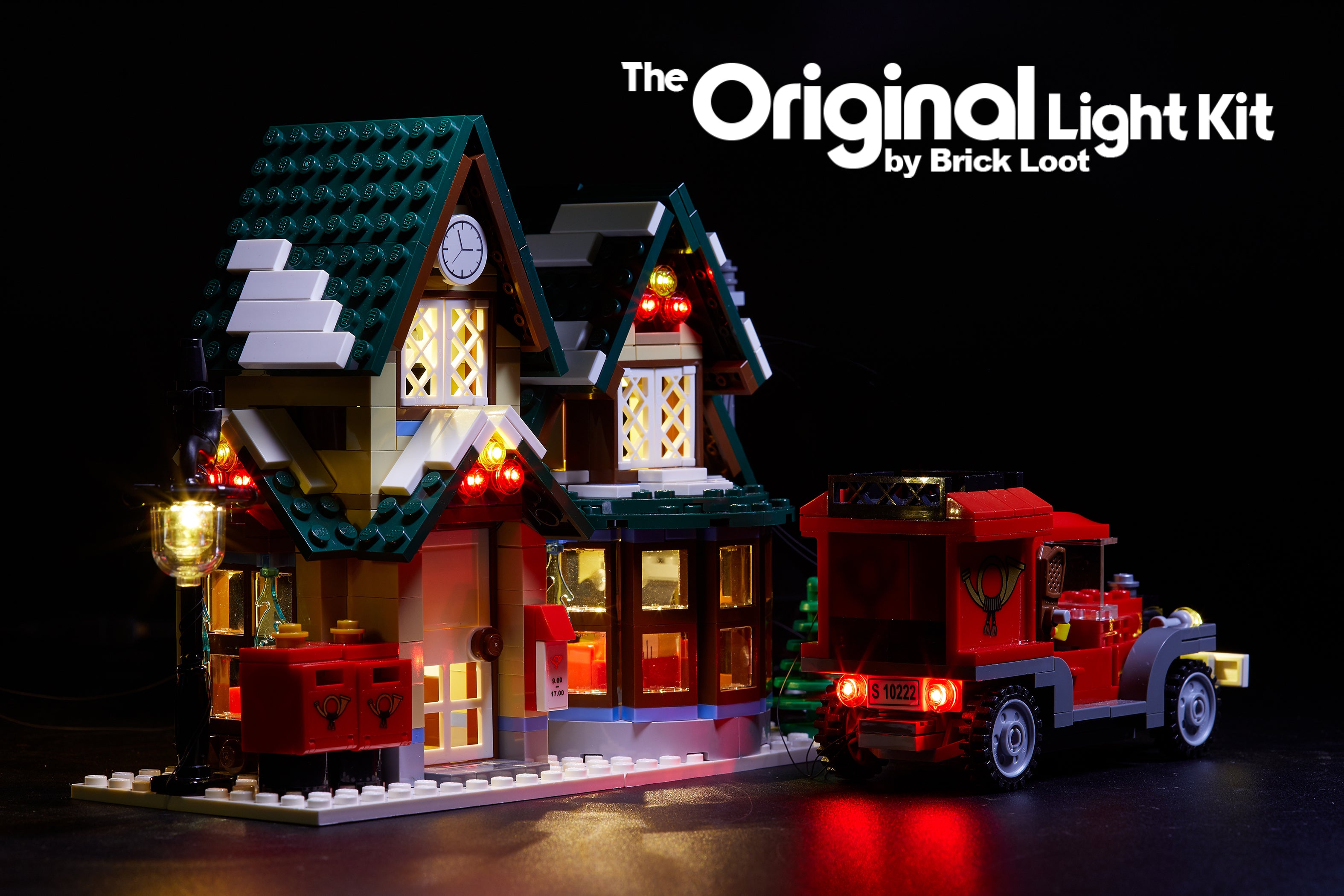 Back view of the LEGO Winter Village Post Office set 10222 with the Brick Loot LED Kit installed.