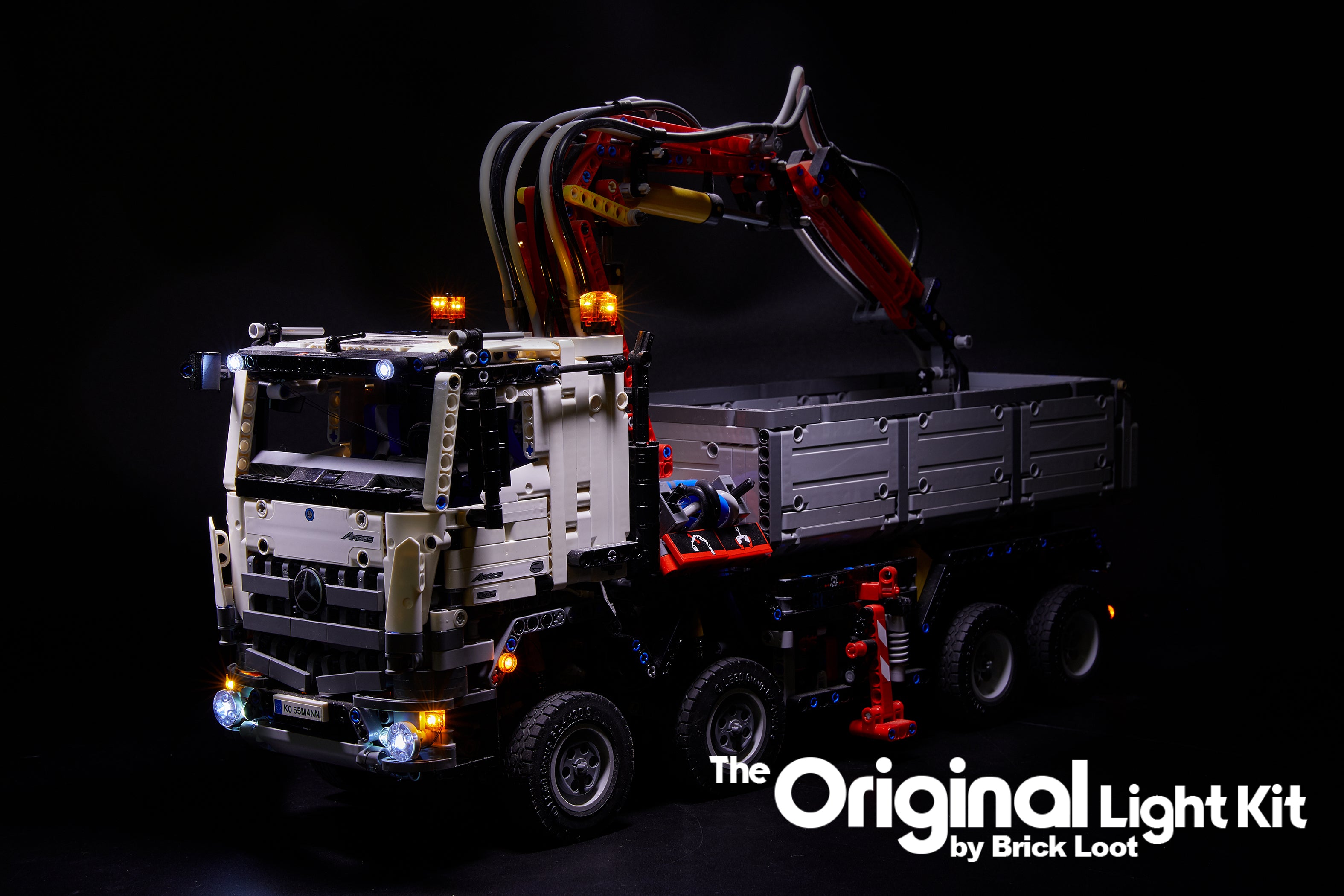 LEGO® Mercedes Benz Arocs 3245 set 42043 with the custom Brick Loot Original LED Light Kit installed.