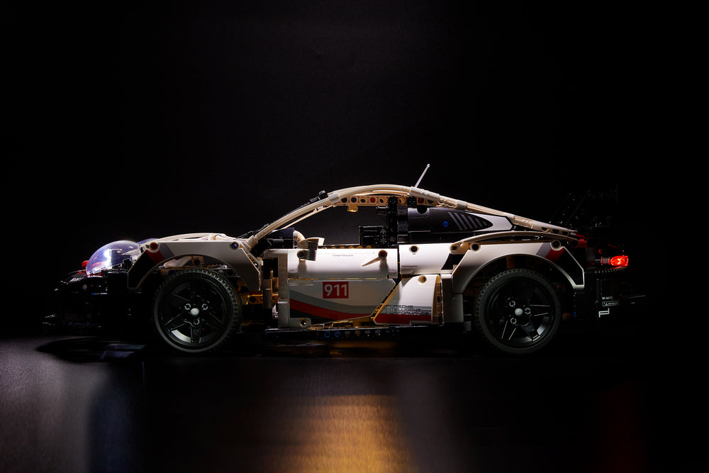 Side view of the LEGO Porsche 911 RSR set 42096 with the custom-designed Brick Loot LED Light Kit installed. 