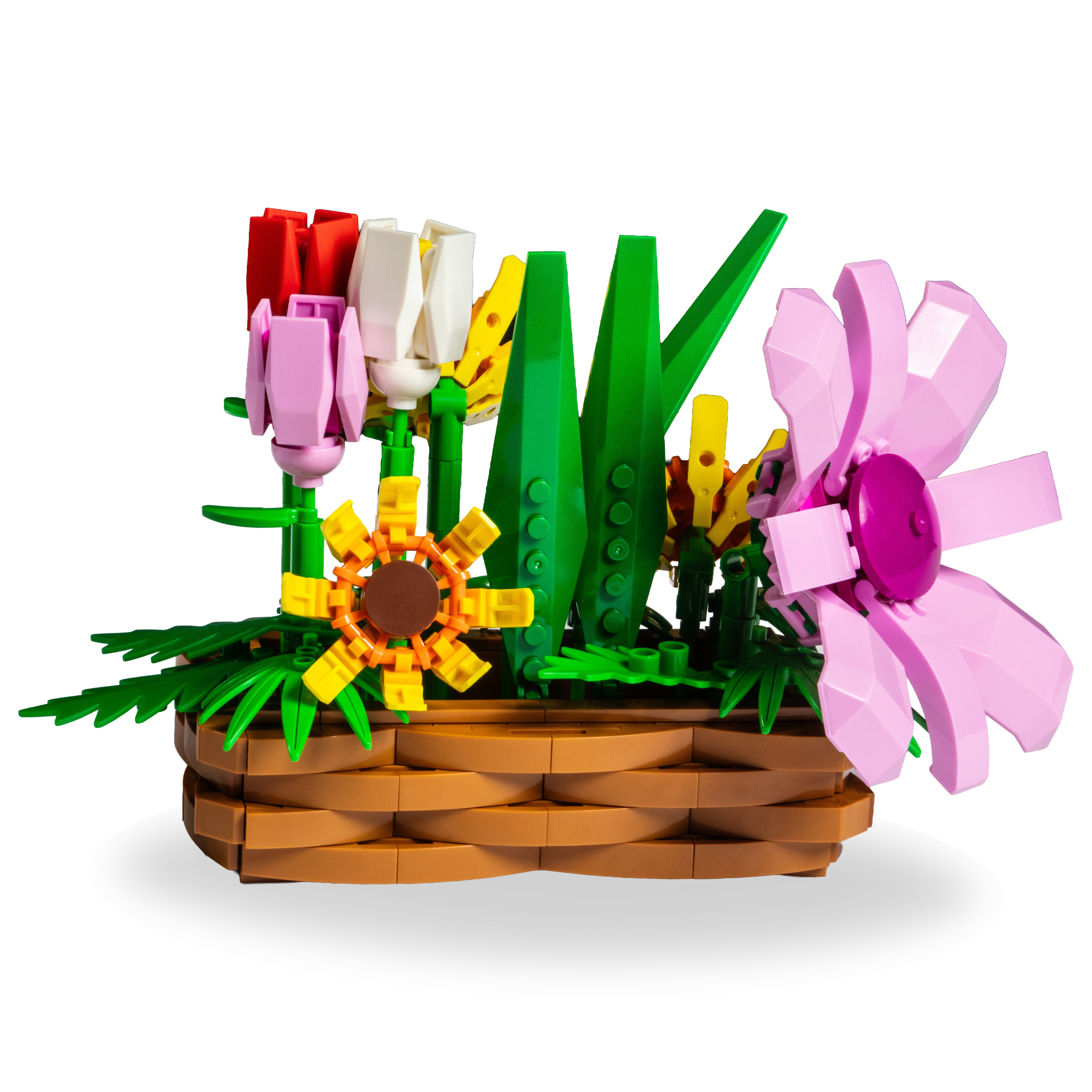 LEGO flower arrangement in a basket on a white background
