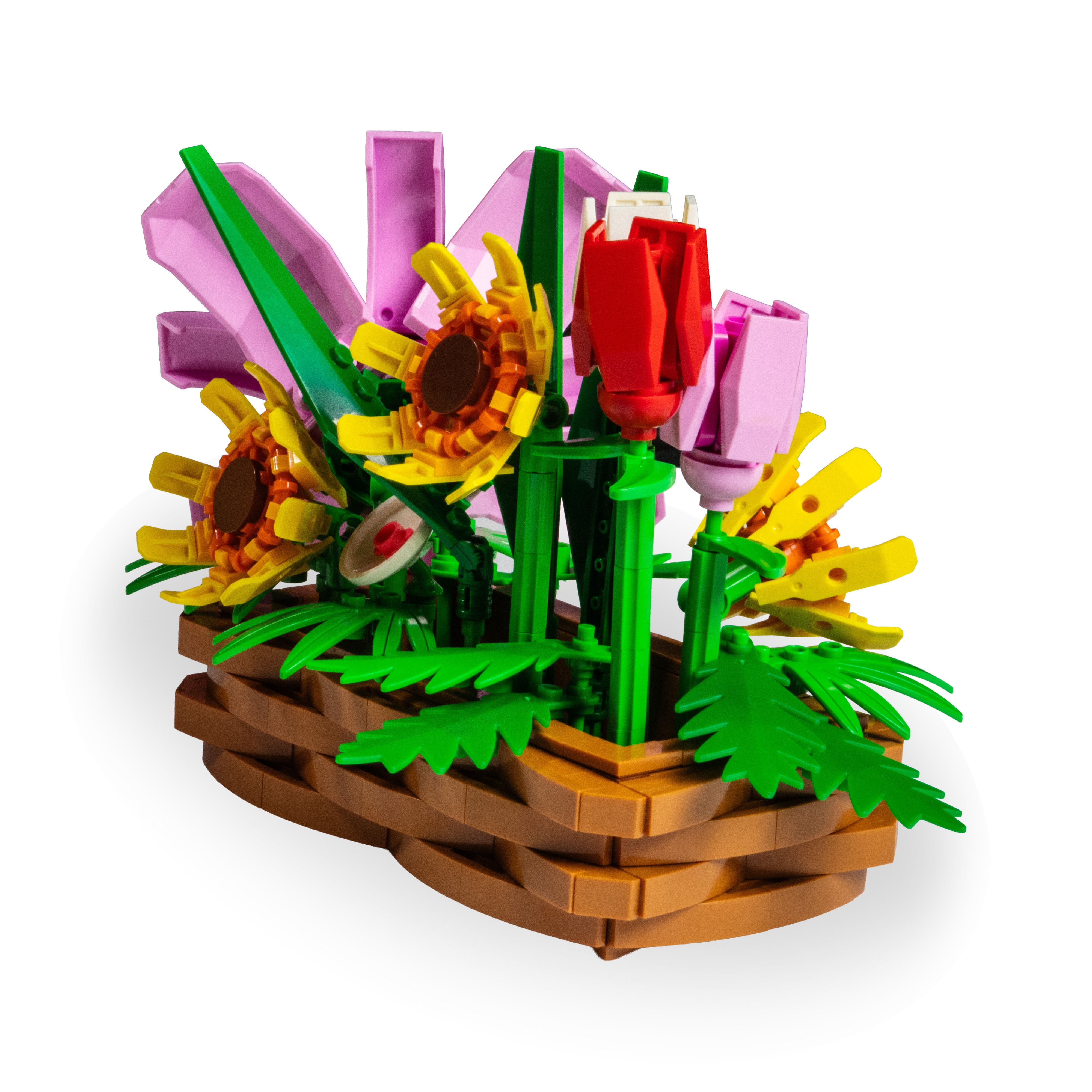 LEGO flower arrangement with sunflowers, roses, and a basket on a white background