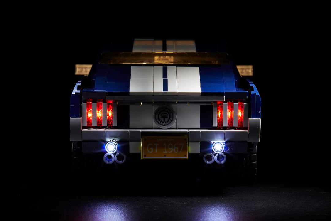 Close-up of the back of the blue LEGO Ford Mustang set 10265, with the custom Brick Loot LED Light kit installed.