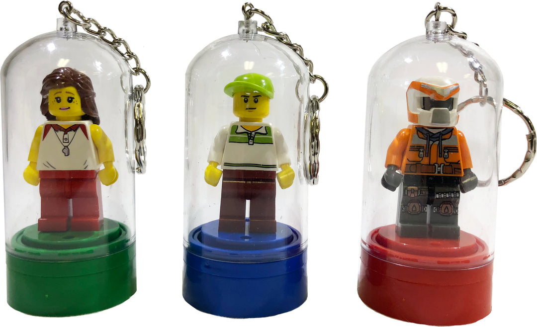 LEGO®-Minifigure-Key-Chains-Christmas-Tree-Ornaments-3-pack-with-minifigures-included-green-blue-red-sold-by-Brick-Loot
