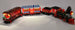 LEGO Disney Train, completely lit up with the Brick Loot LED Light Kit. The train is a part of the LEGO Disney Train and Station set 71044.