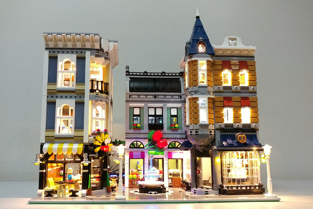 LEGO Assembly Square set 10255 with the Brick Loot LED Light Kit installed. Brilliant lights day and night!