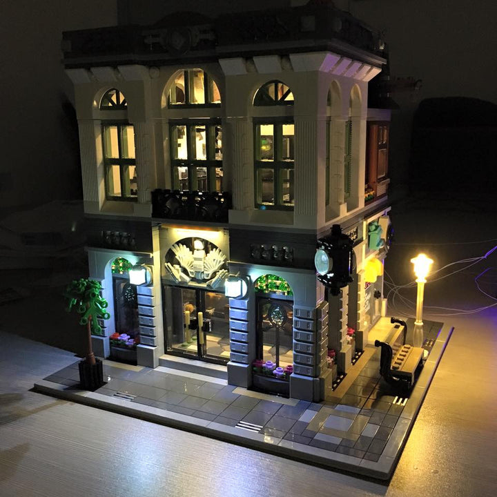 Brick Loot custom LED kit lights up the architectual details and the interior of the LEGO Brick Bank set 10251.