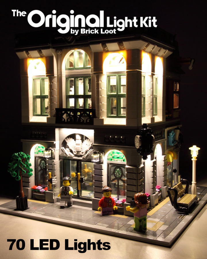 LEGO Brick Bank set 10251, with the Brick Loot custom LED light kit installed. The light kit illuminates the interior and exterior rooms of this LEGO set.