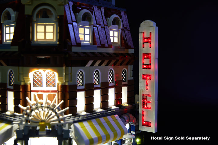 Close of the LEGO Cafe Corner set 10182 with the Brick Loot optional flashing Hotel sign and full light kit installed. 
