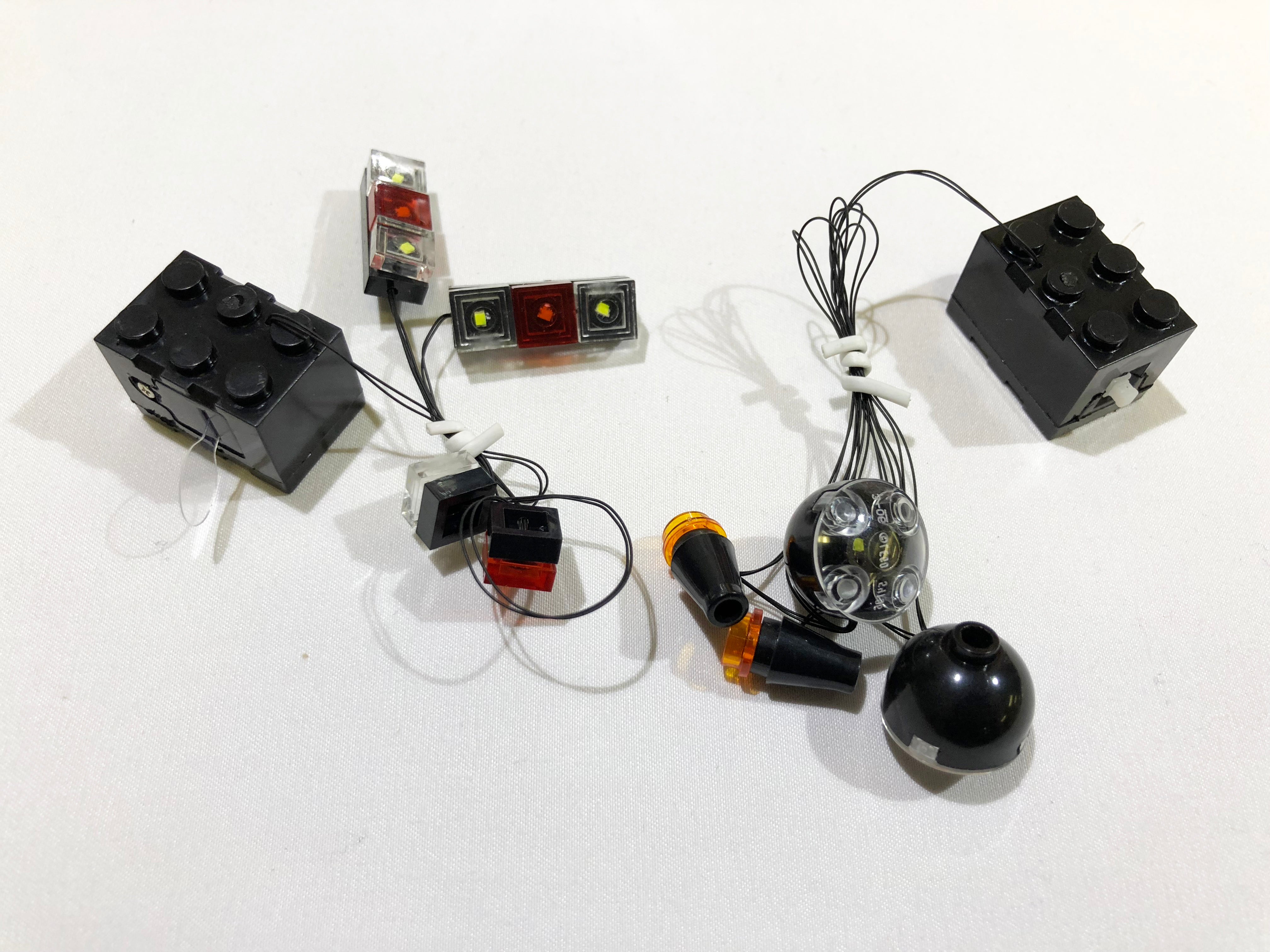 Brick Loot LED Light Kit, custom-designed for the LEGO Ideas Caterham Seven 620R set 21307. This light kit is powered by 2 AG3 battery bricks.