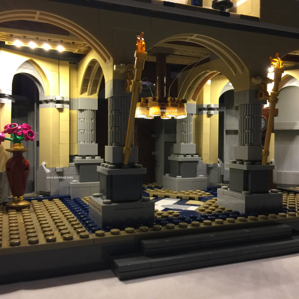 Close up of the interior of some of the rooms of the LEGO Disney Castle set 71040, beautifully illuminated with the Brick Loot LED Light Kit with 105 LED lights.
