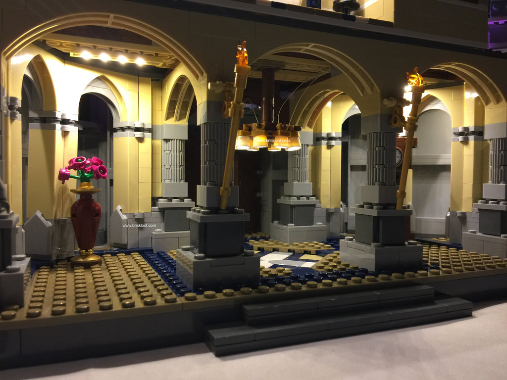 Close up of the interior of some of the rooms of the LEGO Disney Castle set 71040, beautifully illuminated with the Brick Loot LED Light Kit with 105 LED lights.