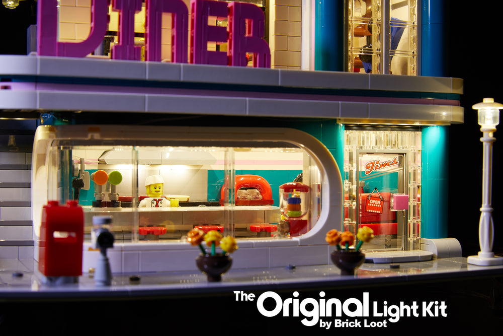 Close up of the LEGO Downtown Diner set 10260, brilliantly illuminated with the Brick Loot LED light kit!