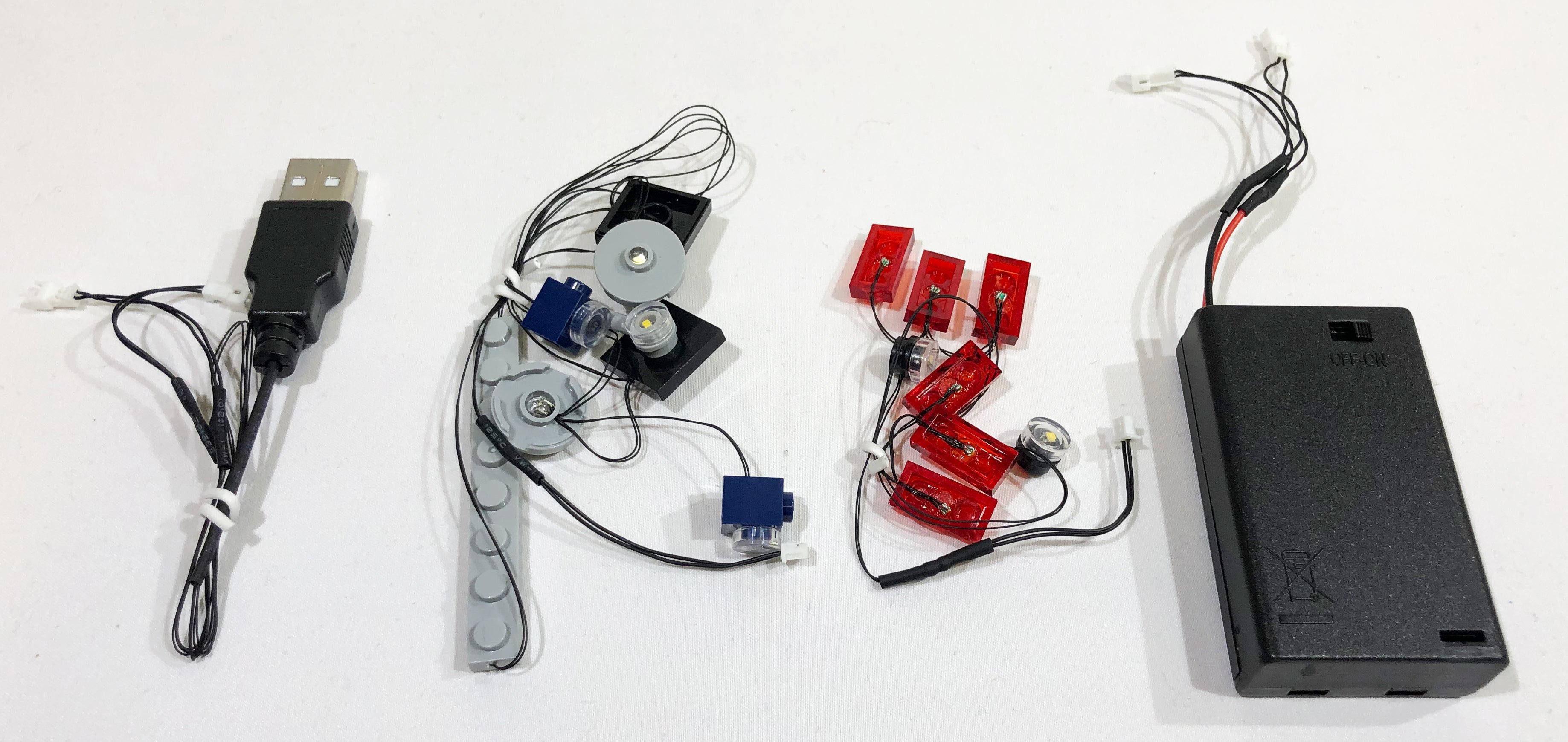 Brick Loot custom LED light strings for the LEGO Ford Mustang set 10265. The light strings are powered by a battery pack (AAA batteries, not included) or through USB; both are included so you can choose!