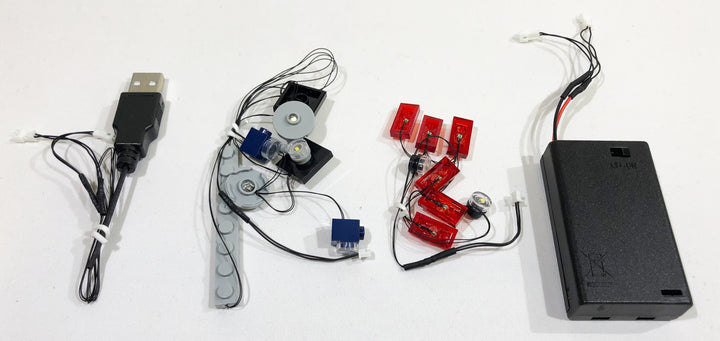Brick Loot custom LED light strings for the LEGO Ford Mustang set 10265. The light strings are powered by a battery pack (AAA batteries, not included) or through USB; both are included so you can choose!