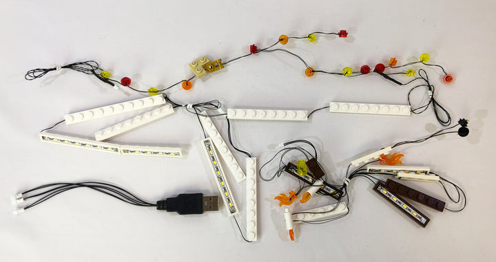 Brick Loot Light Kit LED strings, custom-designed for the LEGO Gingerbread House set 10267.