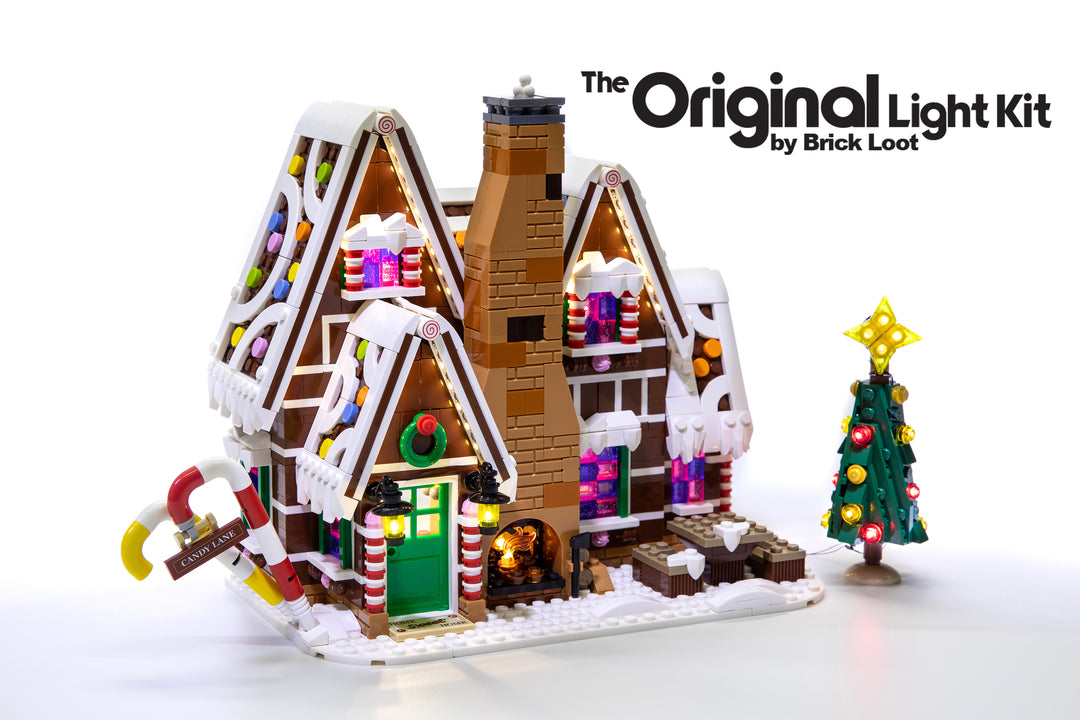 Exterior of the LEGO Gingerbread House set 10267, illuminated with the Brick Loot LED Light kit! The light kit includes lights for the Christmas tree and fireplace! Beautiful day or night!