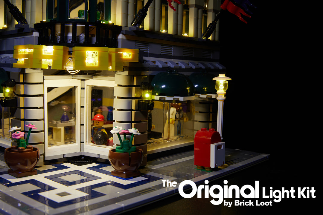 Close-up of the exterior of the LEGO Grand Emporium set 10211 with the Brick Loot LED Light Kit installed.
