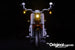 Close-up of the front of the LEGO Harley Davidson Fat Boy Motorcycle set 10269, illuminated with the Brick Loot custom LED kit.  
