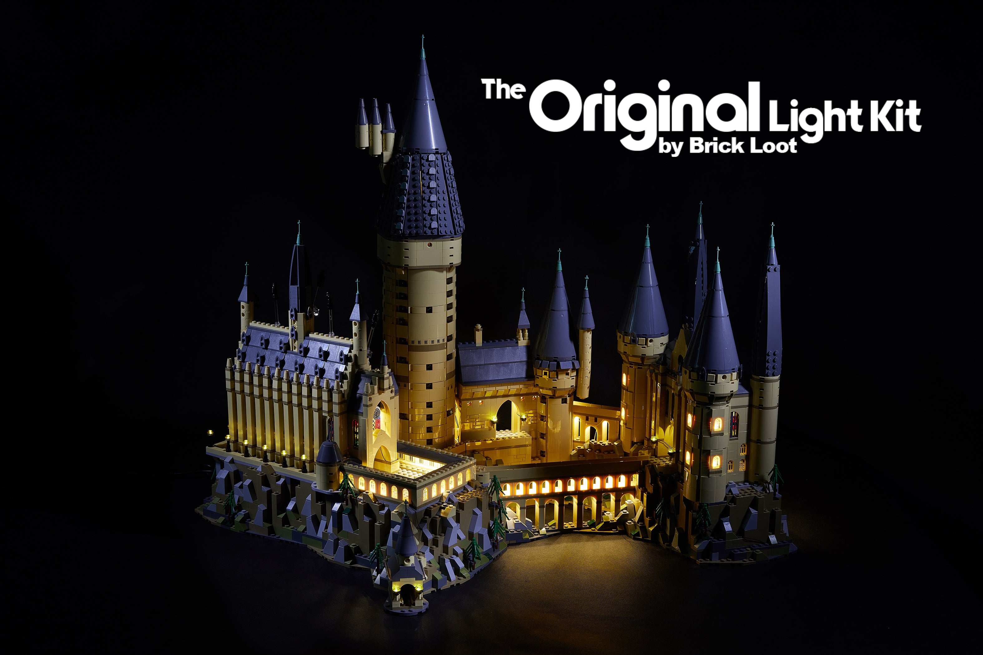 Exterior of the LEGO Harry Potter Hogwarts Castle set 71043 with the Brick Loot LED Light Kit installed.