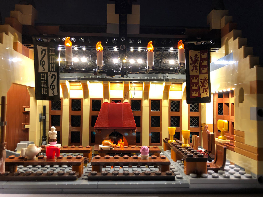 Close-up of the interior of the LEGO Hogwarts Great Hall set 75954, with the Brick Loot LED Light Kit.