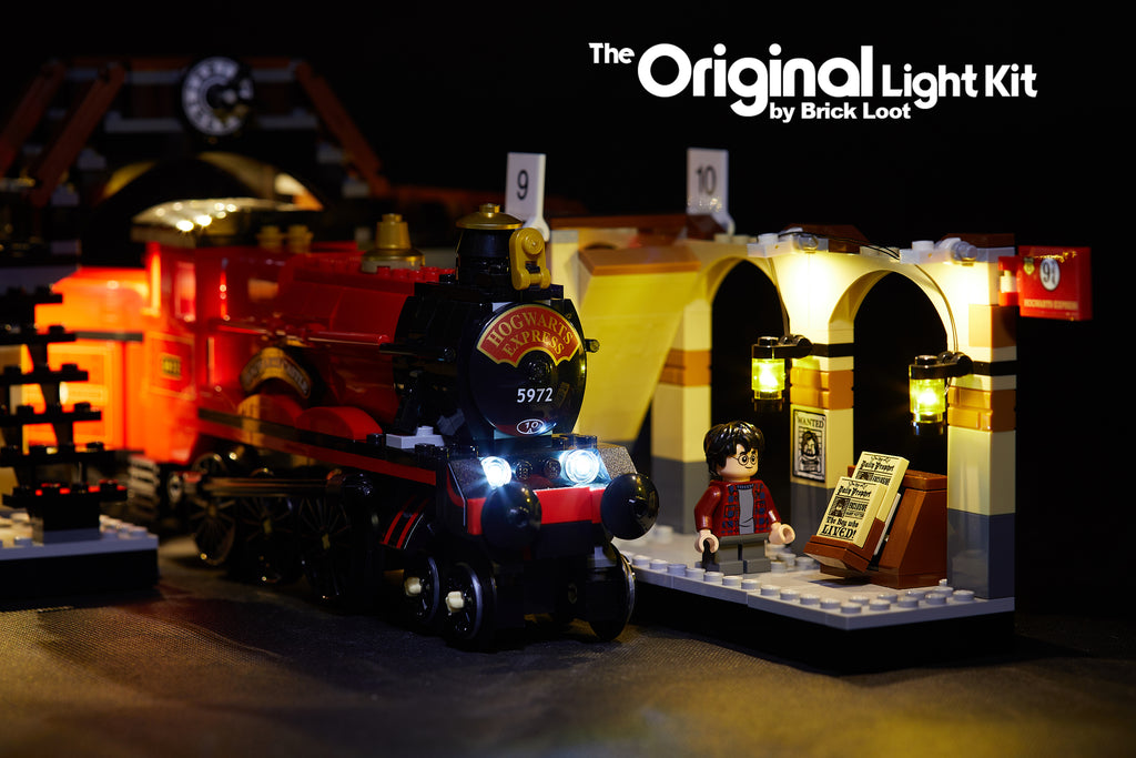Close-up of the Hogwarts Express train and Harry Potter minifigure standing on the railway platform, part of the LEGO Harry Potter Hogwarts Express train 75955 with the Brick Loot LED Light Kit.