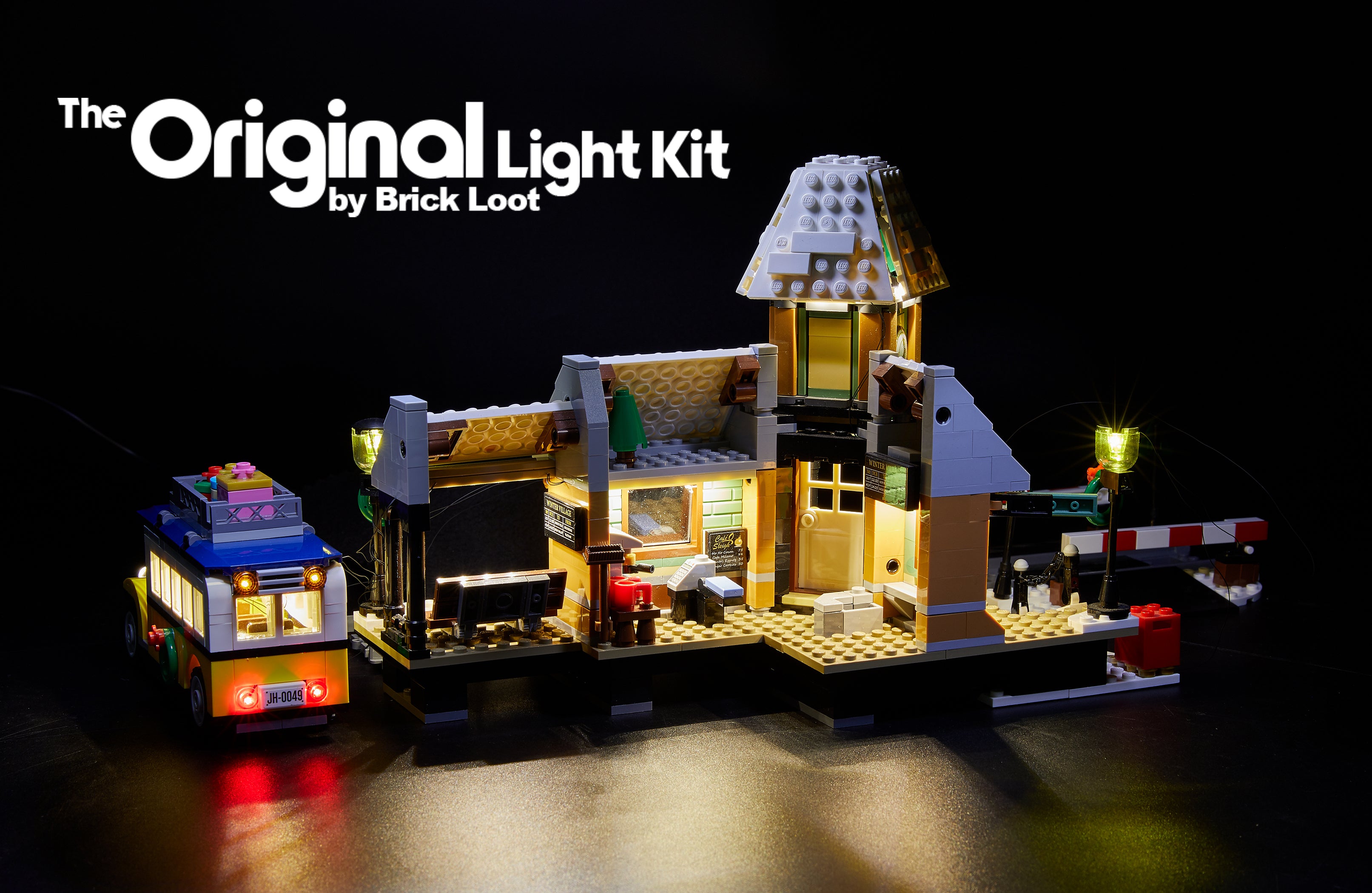 The back of the LEGO Winter Village Station set 10259, beautifully illuminiated with the custom Brick Loot LED Light kit!