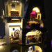 Close up of the interior of some of the rooms of the LEGO Disney Castle set 71040, beautifully illuminated with the Brick Loot LED Light Kit with 105 LED lights.