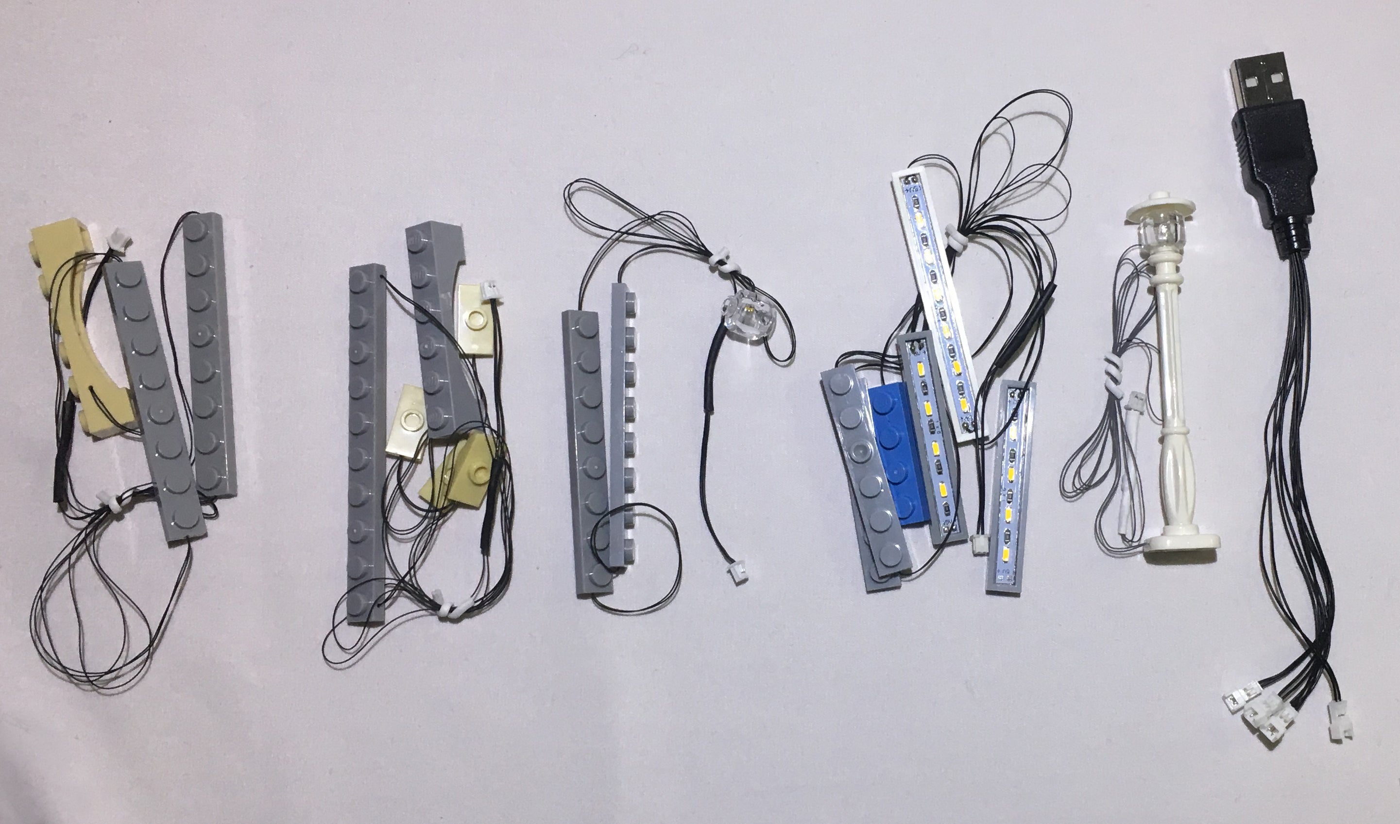 Low voltage, handmade LED light strings, custom designed by Brick Loot for the LEGO Market Street set 10190. These light strings connect to the USB with easy-to-use miniplugs.