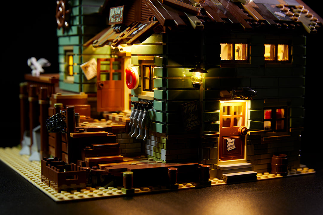 Close up of LEGO® Old Fishing Store set 21310 illuminated Brick Loot Original Light Kit.