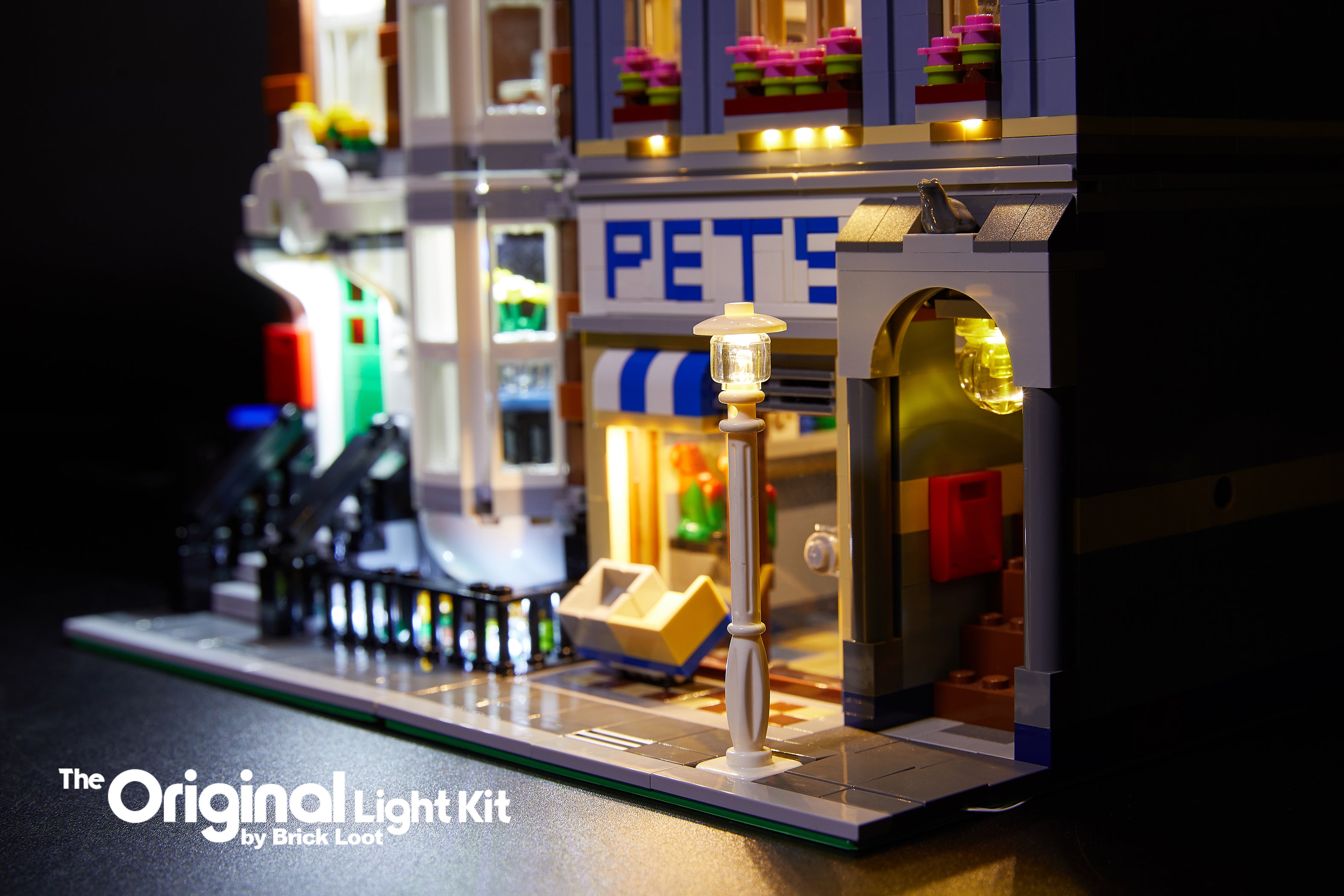 Close up of the Brick Loot LED Lighting Kit, installed on the LEGO Pet Shop set 10218.