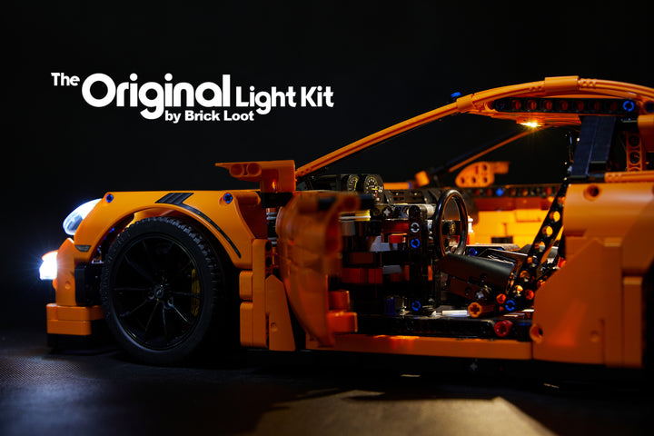 Side and interior of the LEGO Porsche 911 GT3 RS set 42056, lit up with the Brick Loot LED Light Kit.