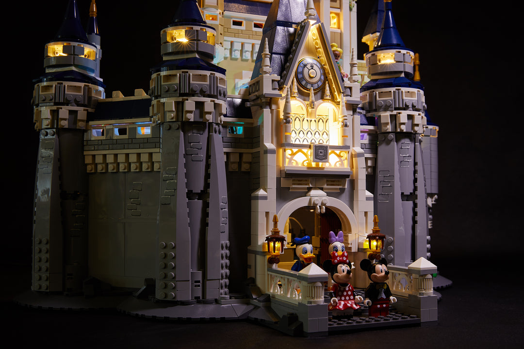 Close up of the exterior of the LEGO Disney Castle set 71040, beautifully illuminated with the Brick Loot LED Light Kit with 105 LED lights.