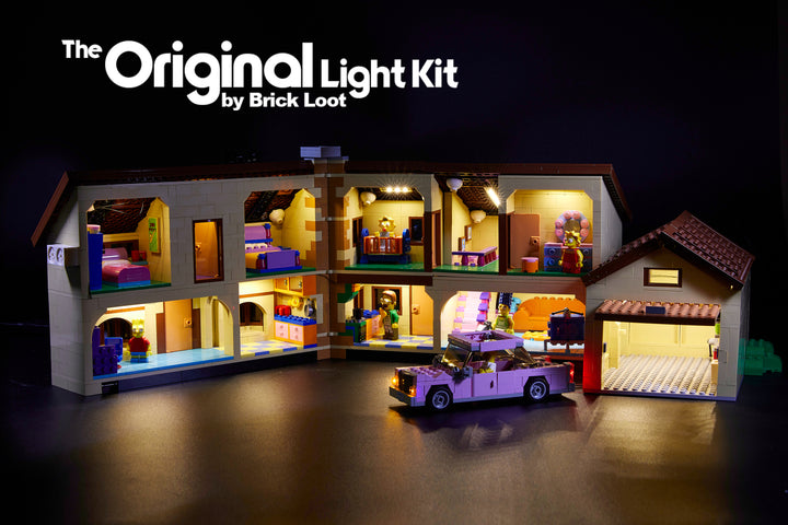 Interior of the LEGO Simpsons House set 71006 with the Brick Loot LED Light Kit. All rooms, the garage, and the car are lit up with this custom-designed LED kit!
