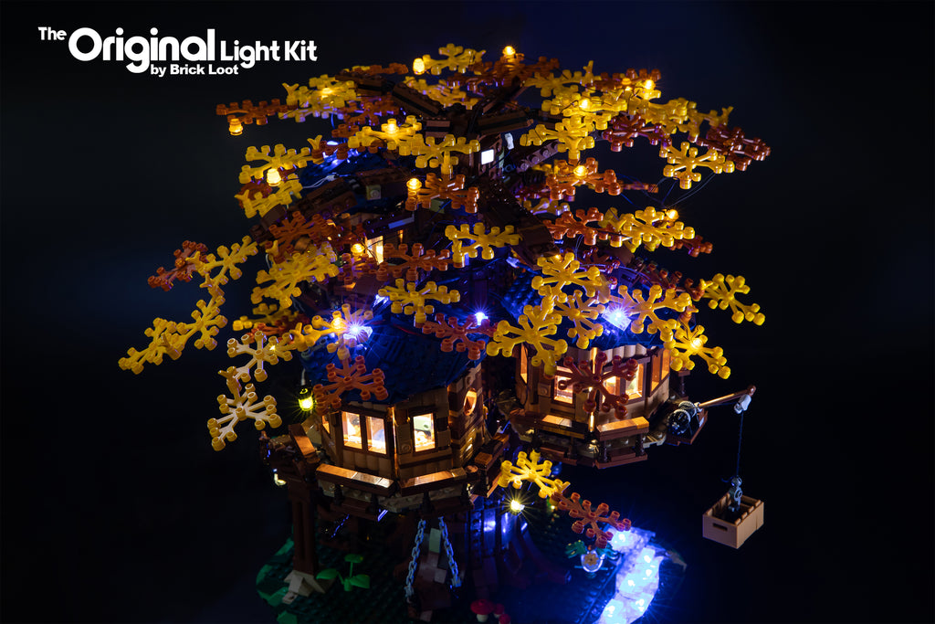 LEGO Ideas Tree House set 21318, fully illuminated with the Brick Loot LED Light Kit.