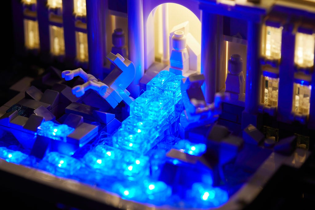 Close up of the illuminiated blue water of the LEGO Architecture Trevi Fountain set 21020 with the Brick Loot LED kit installed. 
