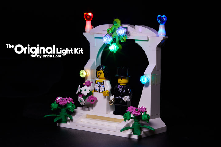 LEGO Wedding Favor Set 40165, illuminated with the custom Brick Loot LED Light Kit with colorful twinkling lights.