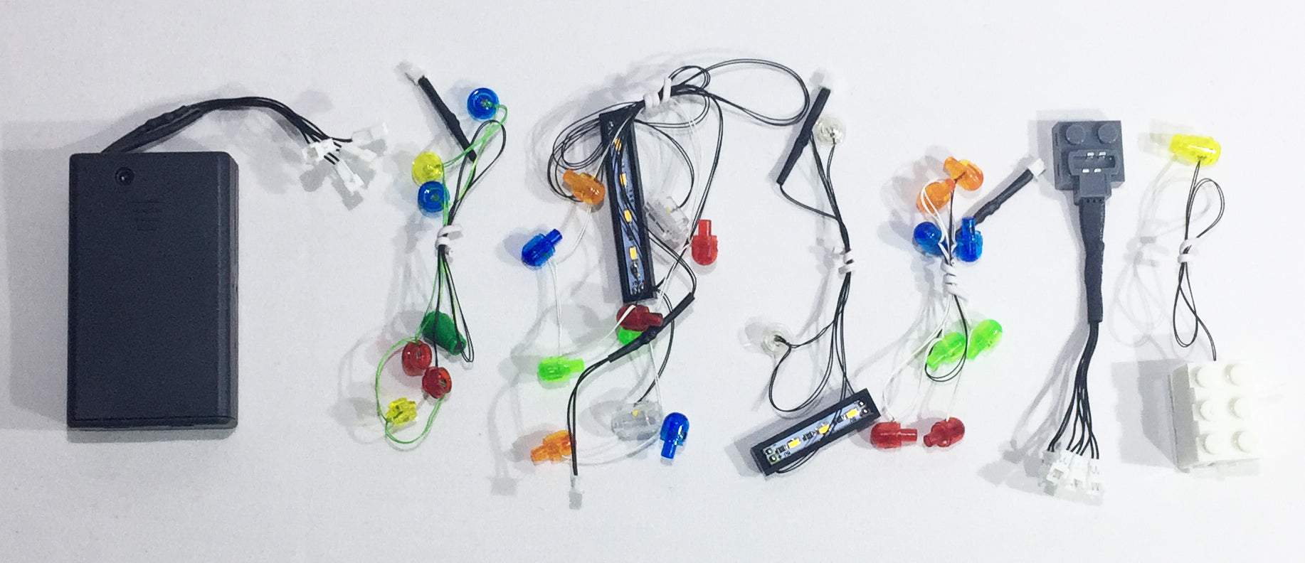 LED Light kit strings, custom designed by Brick Loot for the LEGO Winter Holiday Train set 10254. Powered by battery brick and battery pack or power functions adapter (both included). 