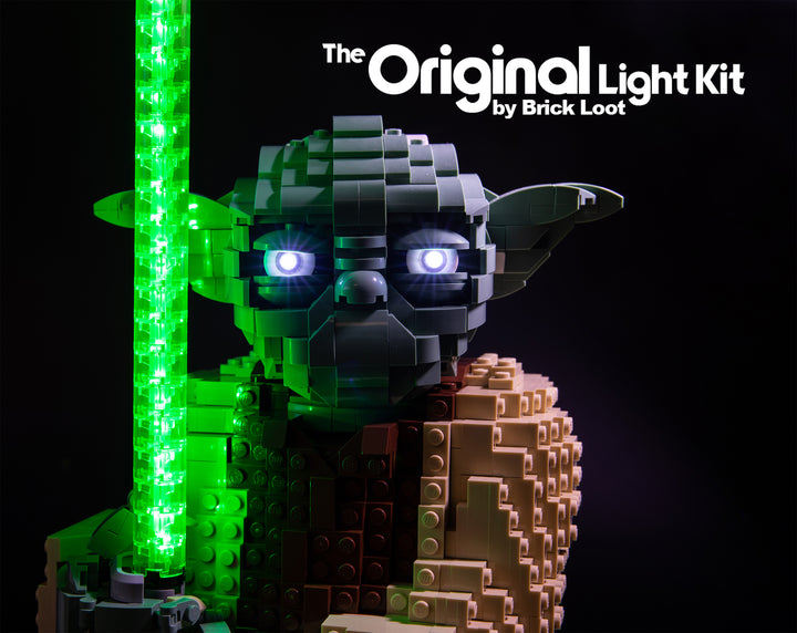 Close-up of the LEGO® Star Wars Attack of The Clones Yoda Building Model and Collectible Minifigure with Lightsaber set 75255  with the Brick Loot LED Lighting Kit, illuminating Yoda's eyes and lightsaber.