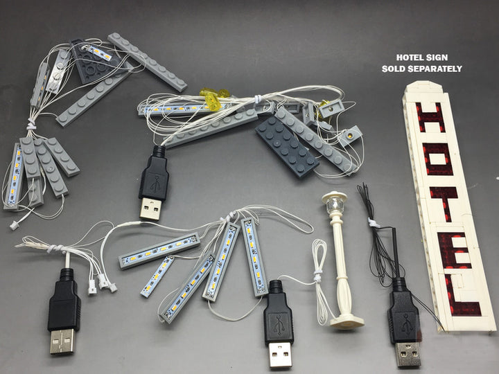 Custom LED light strings, designed by Brick Loot for the LEGO Cafe Corner, set 10182.  The light strings connect to the USB plugs with easy-to-use mini-plugs. The flashing hotel sign, shown, is sold separately. 